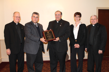 Fr. Enzo Addari receives St. Camillus Award from Catholic Medical Association